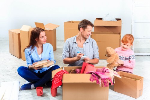 Moving team preparing belongings for a house relocation in Ruislip