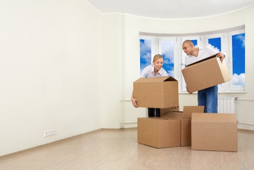 Local office move in progress with careful handling of desks and files