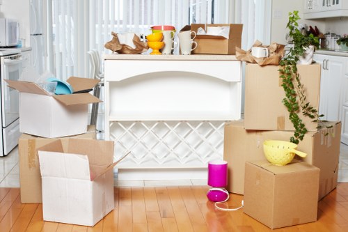 Professional movers handling furniture during a house move in Ruislip