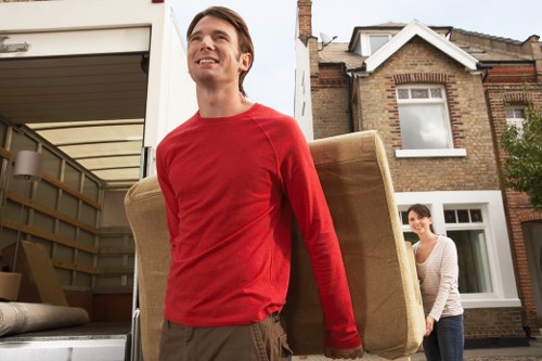 Local moving truck service handling boxes and furniture in Ruislip