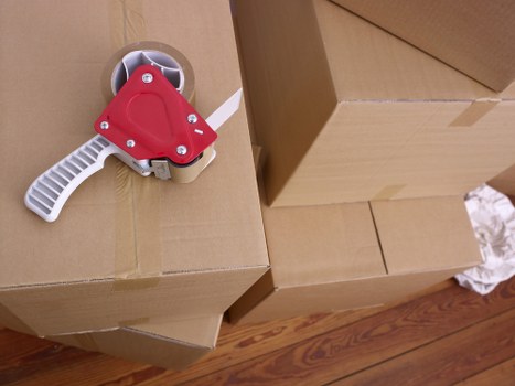 Removal team planning a house move in Ruislip residential street